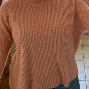 Pink knitted sweater